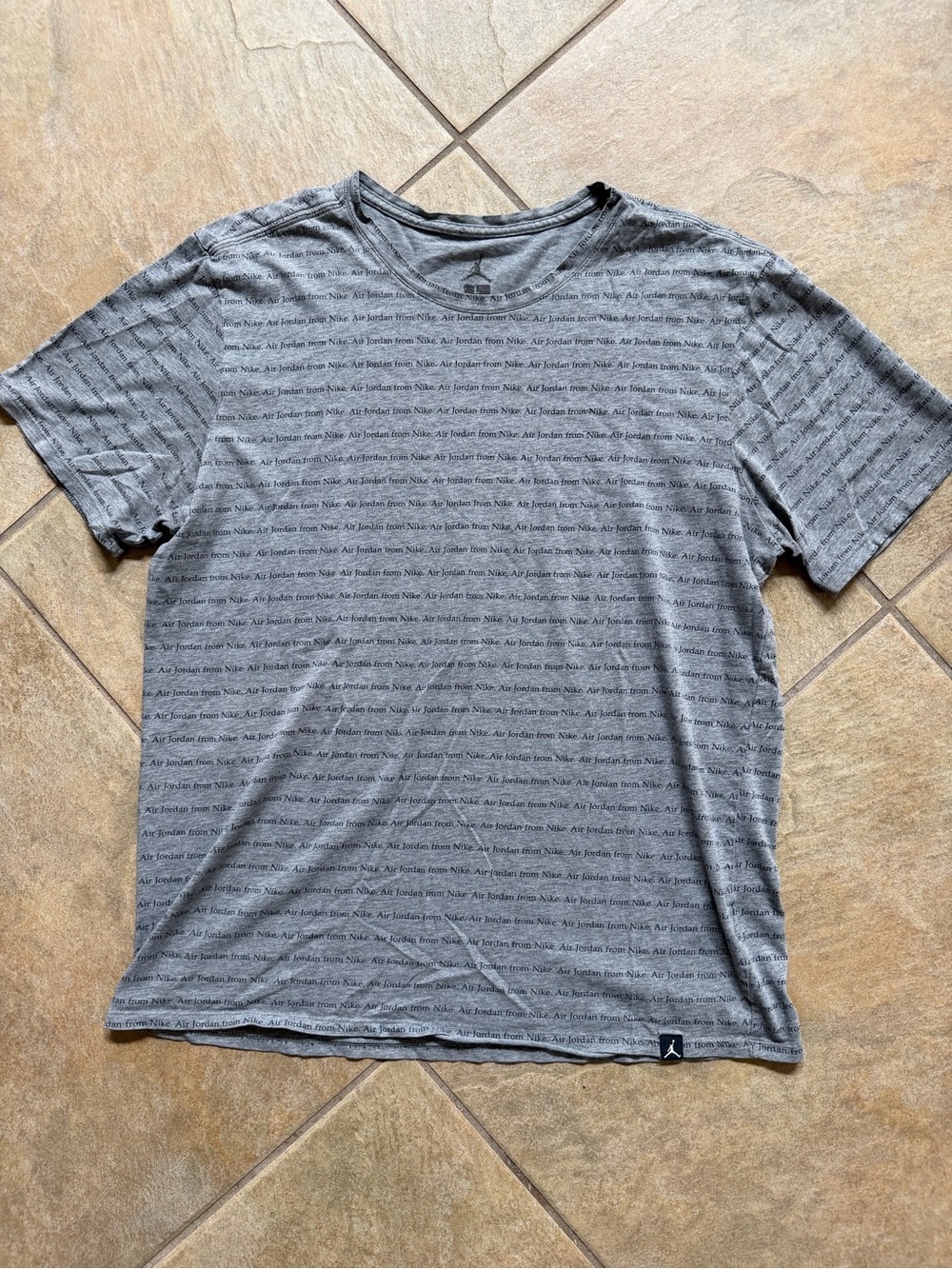 Nike Men's Gray Short-Sleeve Crew T-Shirt with Subtle Text Pattern